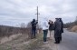 The Yahad - In Unum team during an interview with a local witness nears the execution site. ©Aleksey Kasyanov/Yahad - In Unum